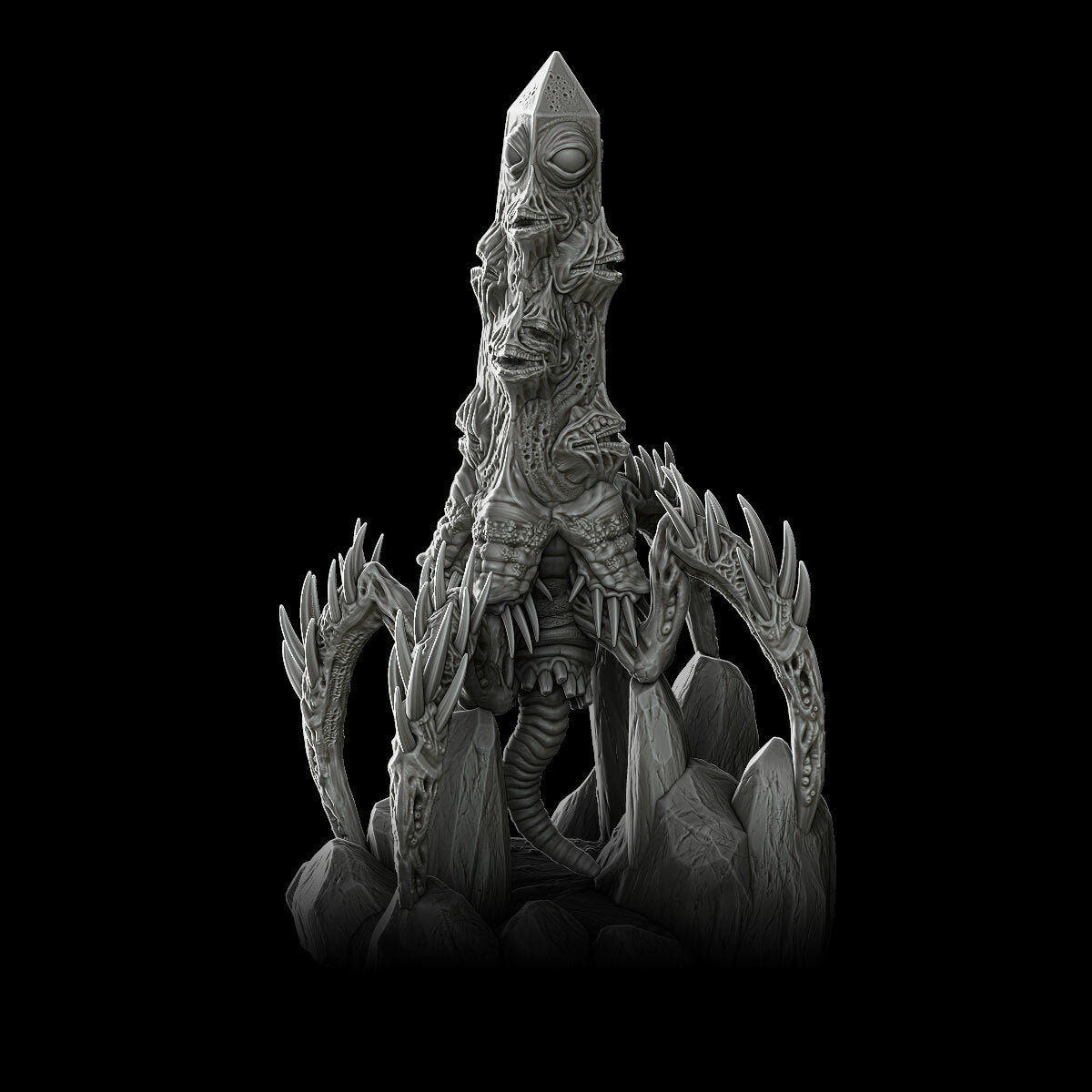 a statue of a creature sitting on top of a pile of rocks