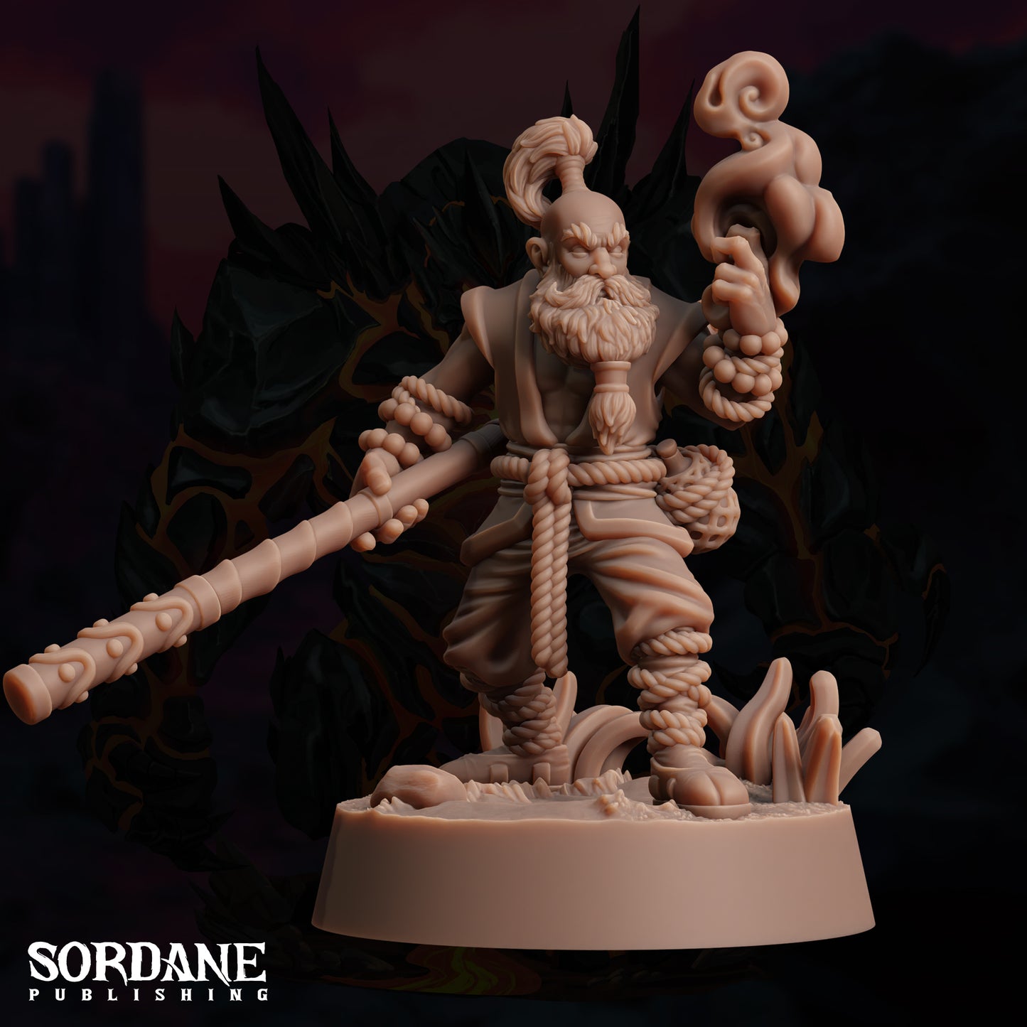 a statue of a man holding a large stick