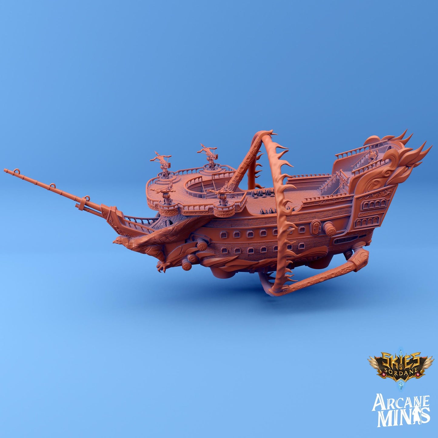 a wooden model of a pirate ship on a blue background