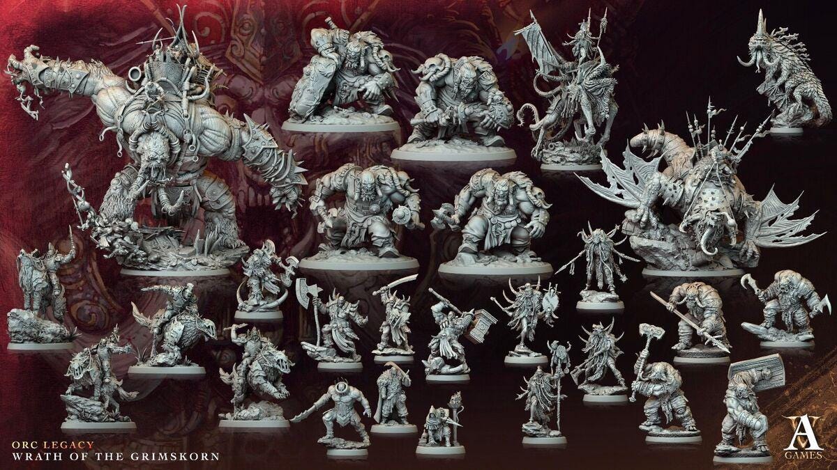 a bunch of warhammers are displayed on a table