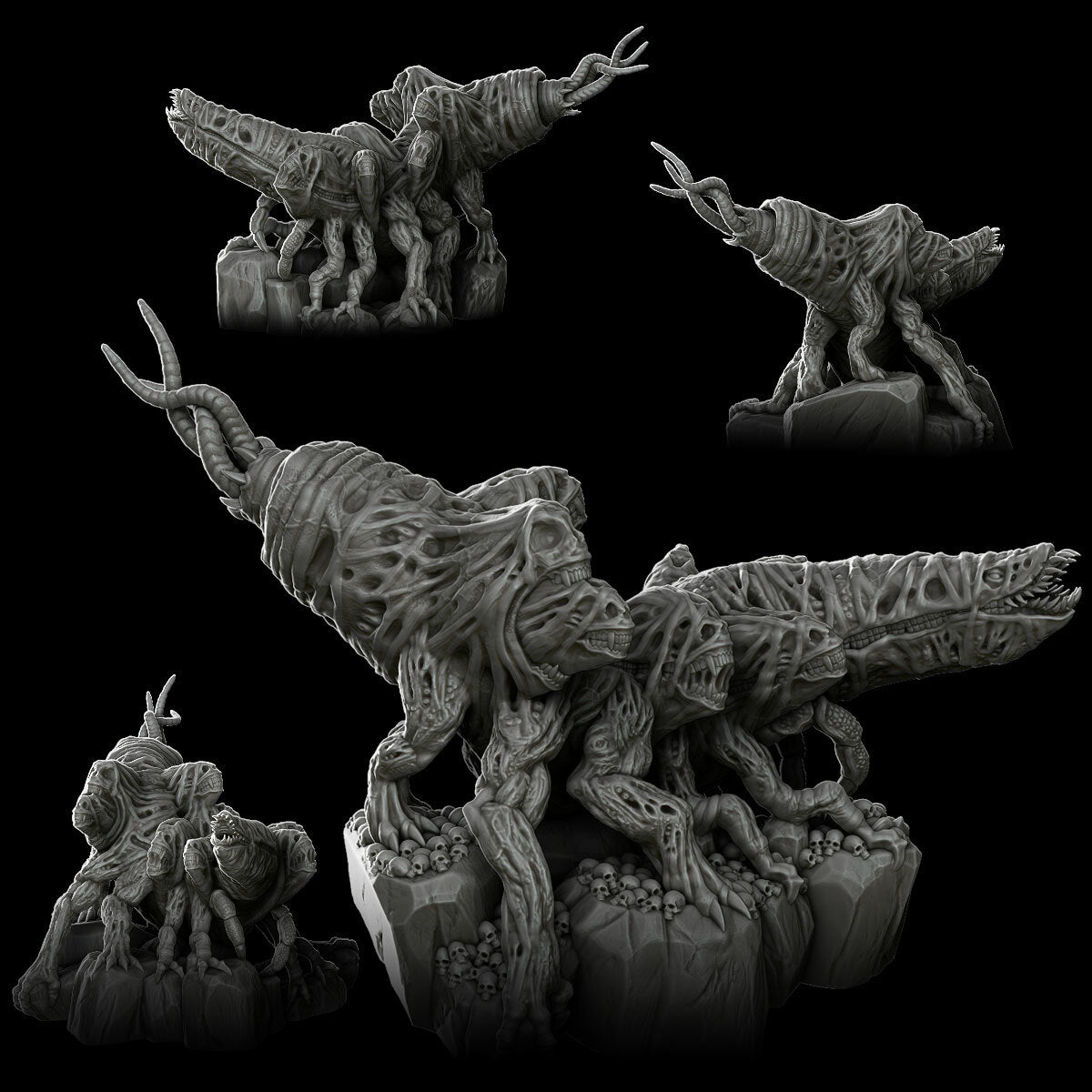 a group of alien figurines sitting on top of a rock