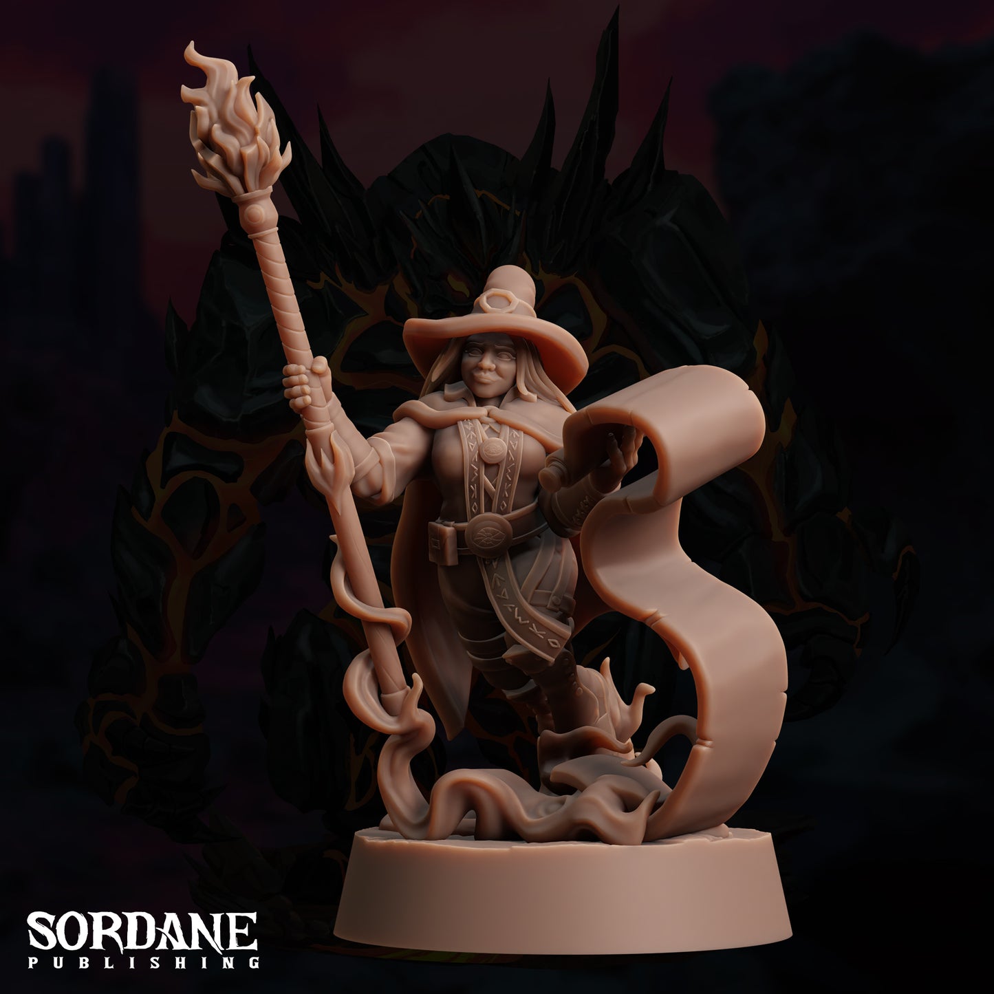 a statue of a wizard holding a staff