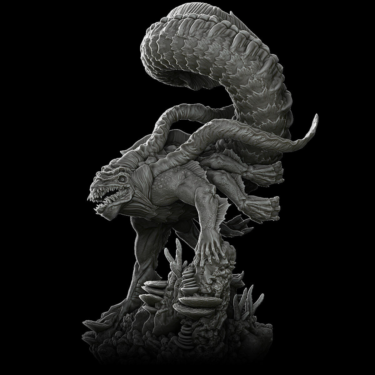 a black and white photo of a statue of a demon