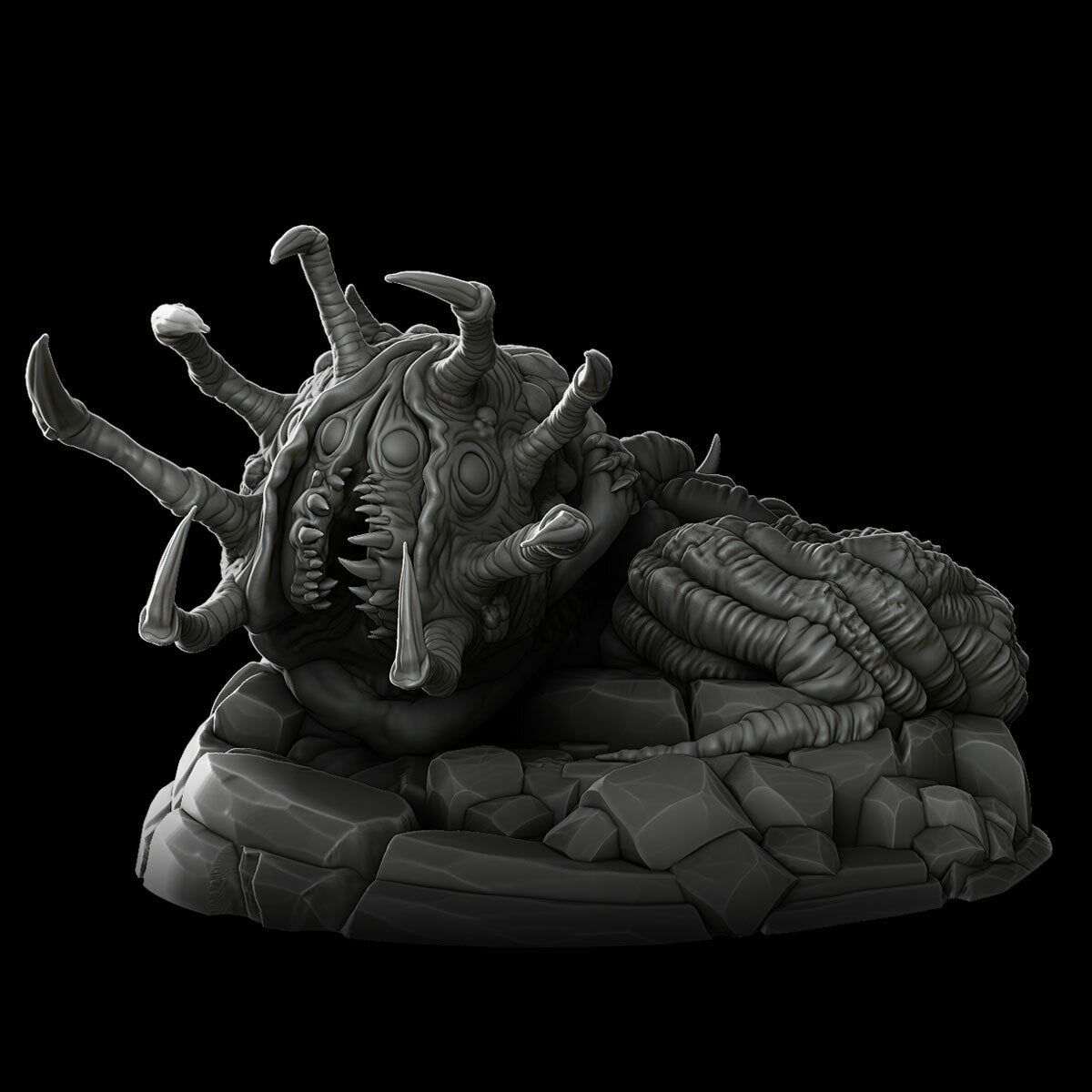 a strange creature laying on top of a pile of rocks