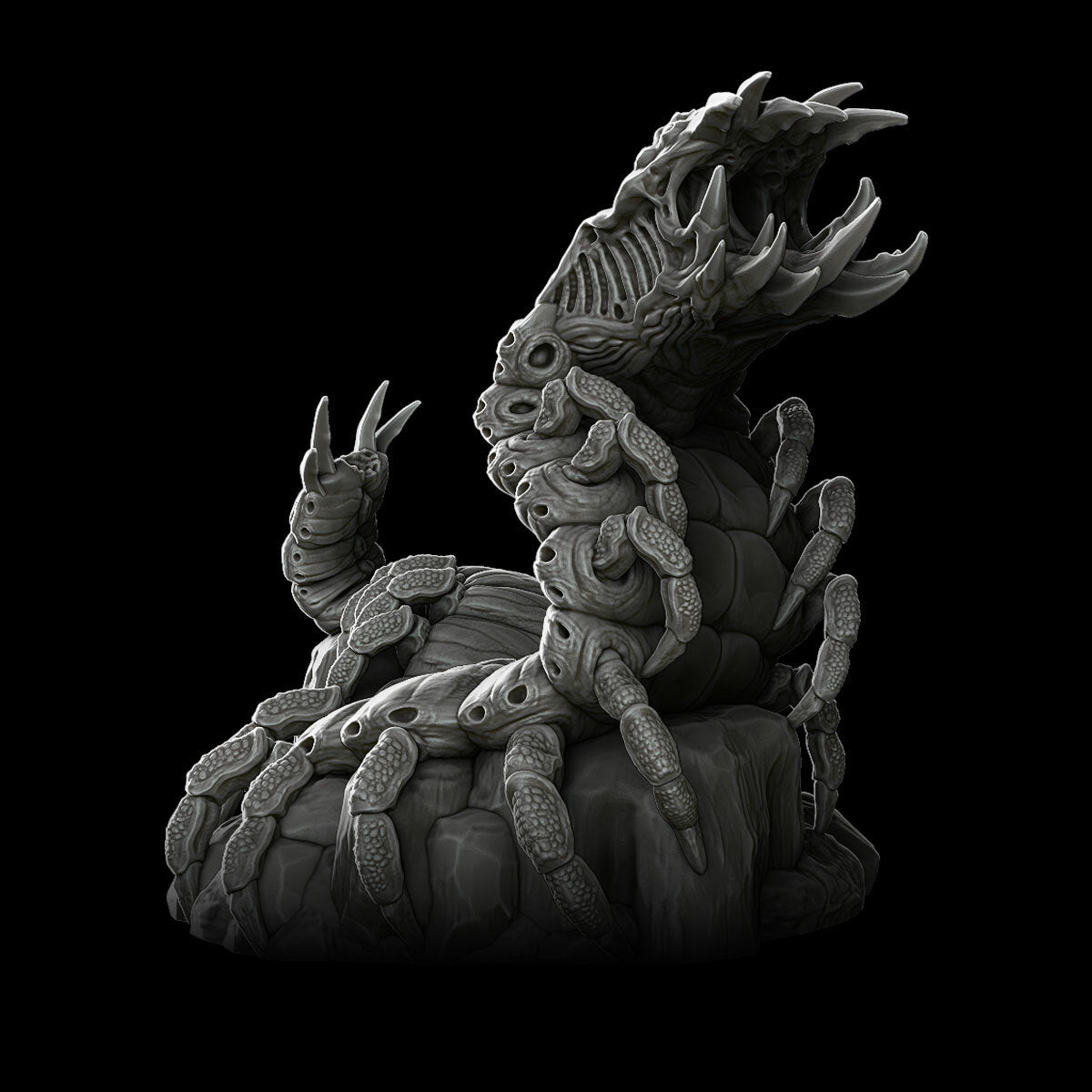 a black and white photo of a statue of a creature