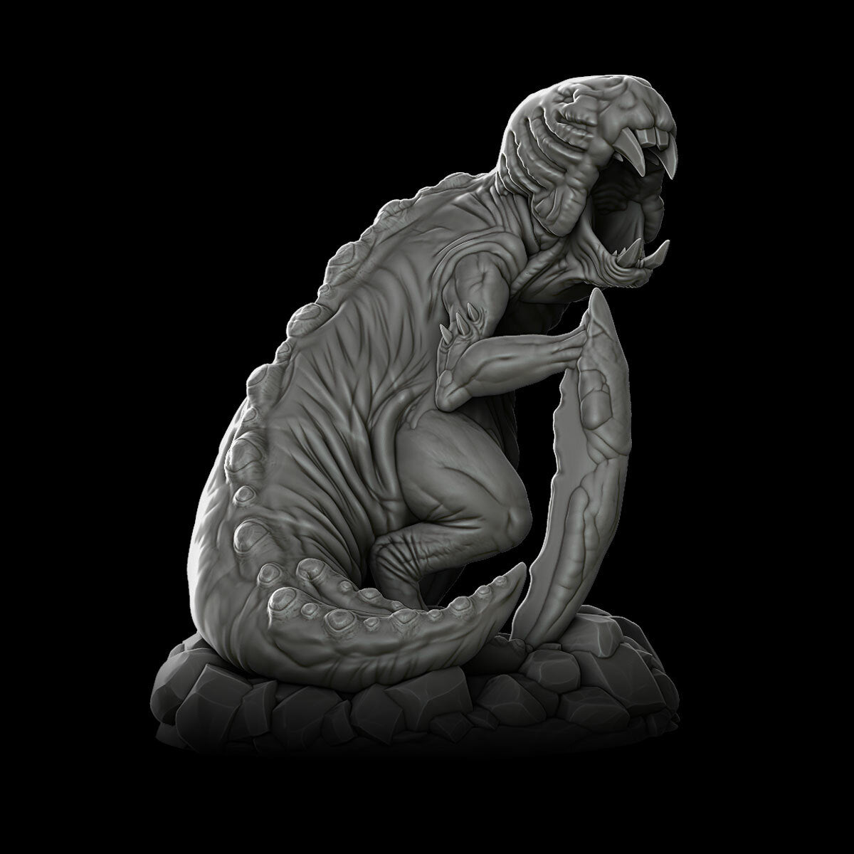 a statue of an alien sitting on top of a rock