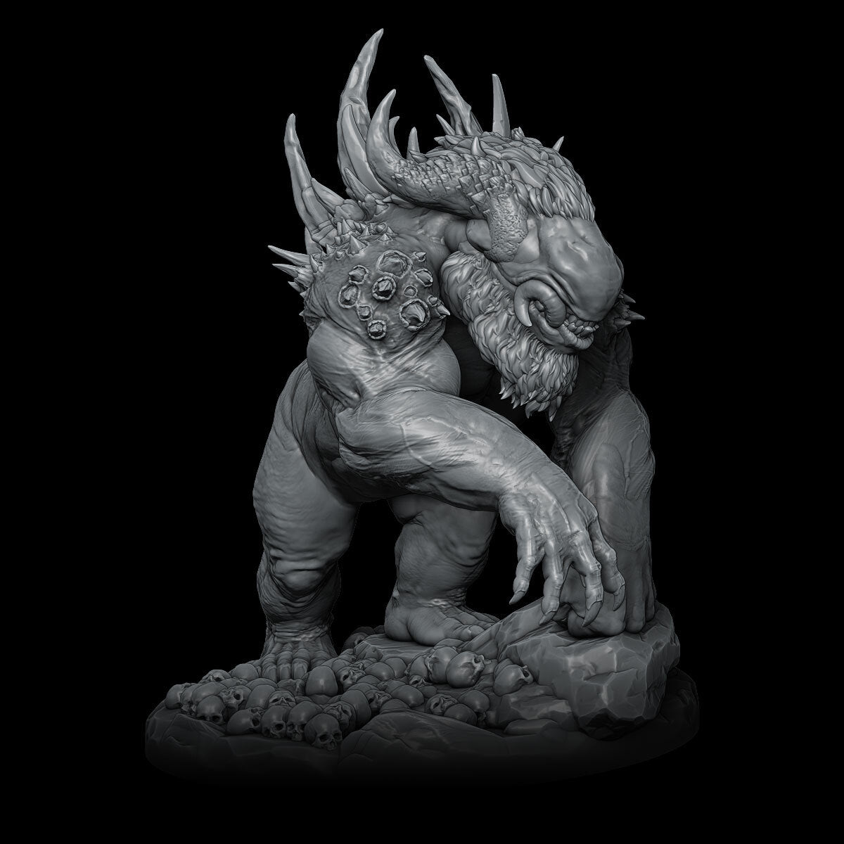 a black and white photo of a statue of a demon