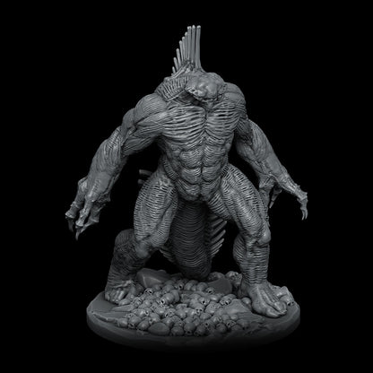 a statue of a creature on a black background