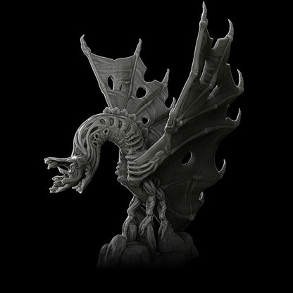a statue of a dragon on a black background