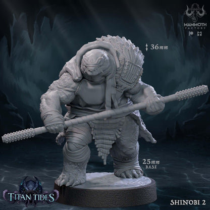 a statue of a giant creature holding a spear