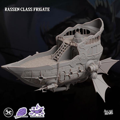 a plastic model of a pirate ship on a black background
