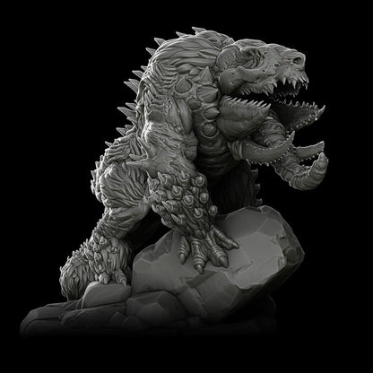 a black and white photo of a godzilla statue