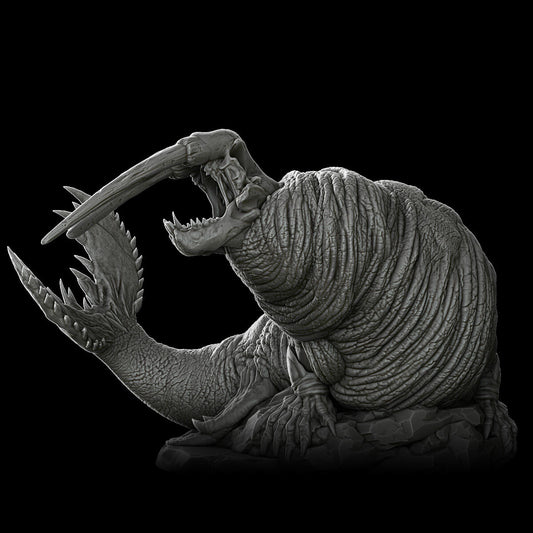 a black and white photo of a creature with its mouth open