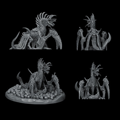 a set of four black and white figurines of monsters