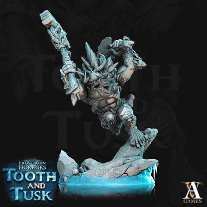 a statue of tooth and tusk on a black background