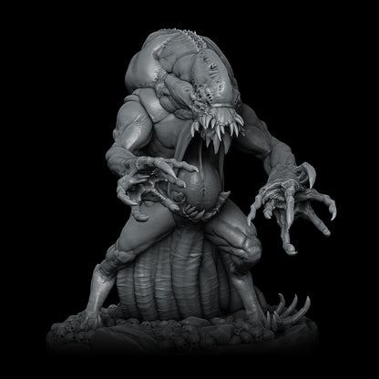 a statue of a creature with large teeth