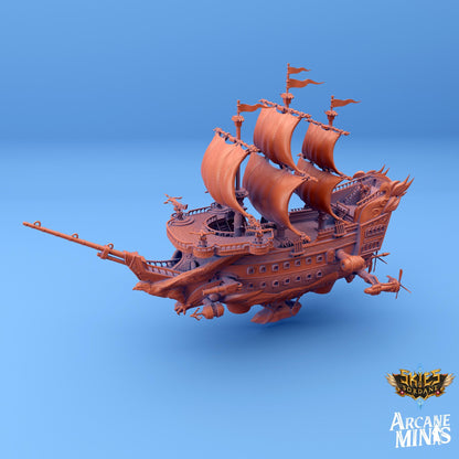 a wooden model of a pirate ship on a blue background