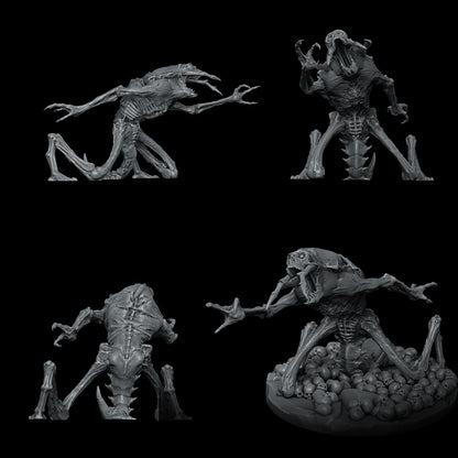 a group of alien figurines sitting next to each other