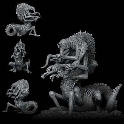 a black and white photo of a statue of a creature