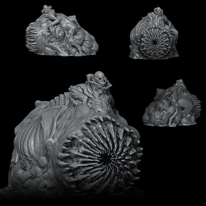 a black and white photo of three sculptures