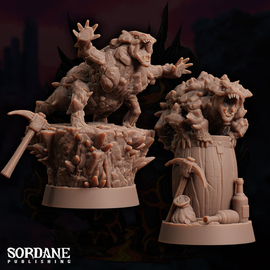 a statue of a demon and a demon in a pot