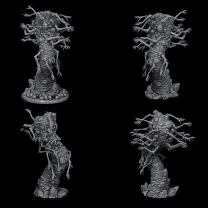 a set of four miniature figurines sitting on top of each other