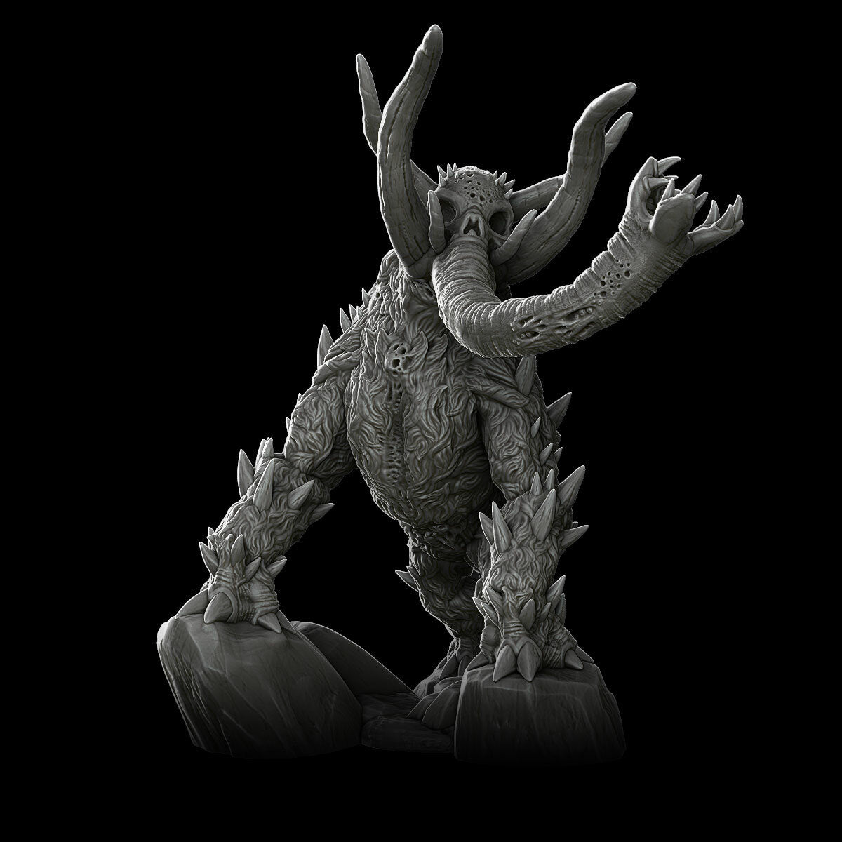 a black and white photo of a statue of a monster