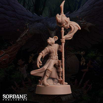 a statue of a man with a staff and a bird