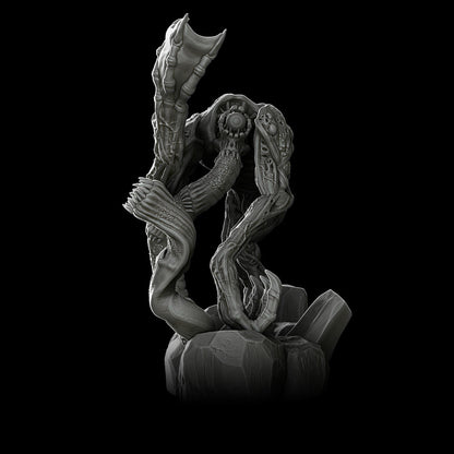 a black and white photo of a statue