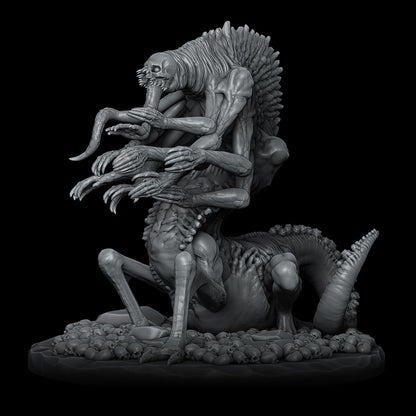 a statue of a demon riding a demon