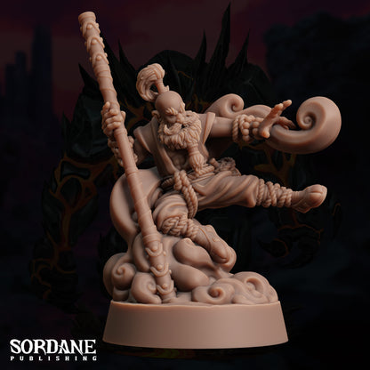 a statue of a man holding a sword