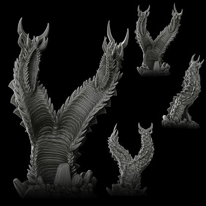 a black and white photo of a monster like creature