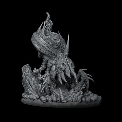 a black and white photo of a statue of a creature