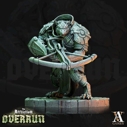 a statue of a creature holding a bow and arrow