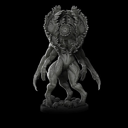 a black and white photo of a creature on a black background