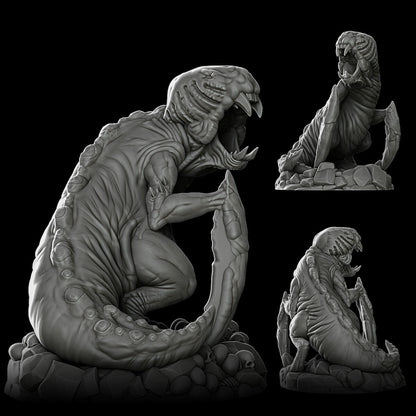 a statue of an alien sitting on a rock