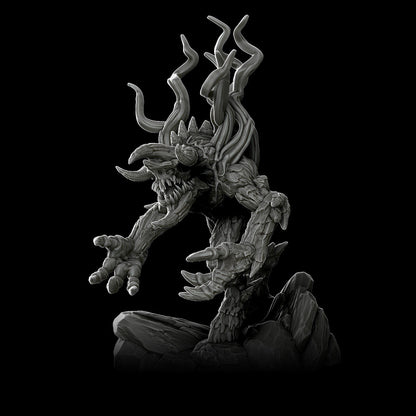 a black and white photo of a demonic creature