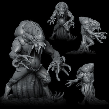 a set of three alien statues on a black background