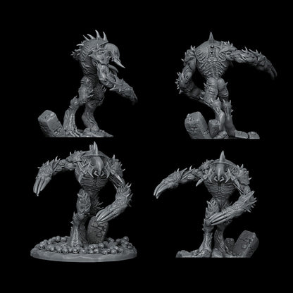 a set of four black and white figurines of monsters
