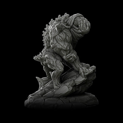 a statue of a creature on a black background