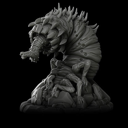 a black and white photo of a statue of a creature