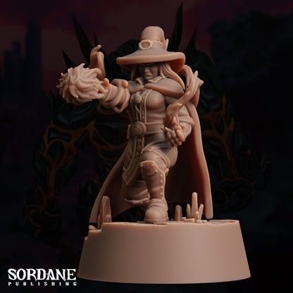 a statue of a man with a hat and a sword