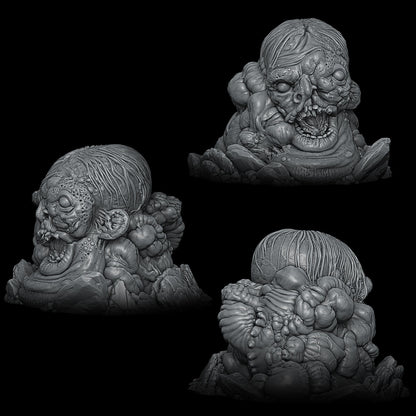 a group of three sculptures of heads and hands