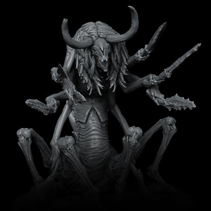 a statue of a demon with horns and claws