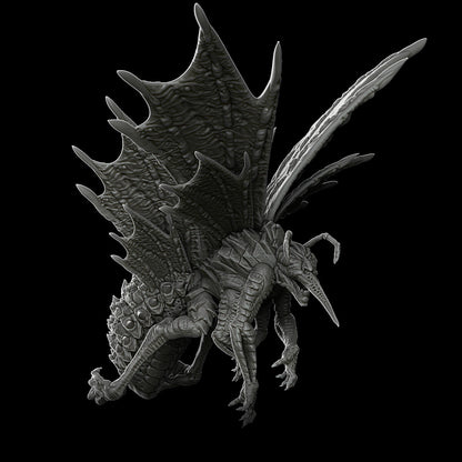 a black and white photo of a dragon