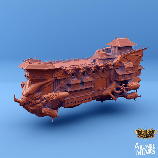 a wooden model of a ship on a blue background