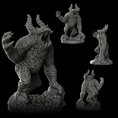 a set of three figurines of monsters