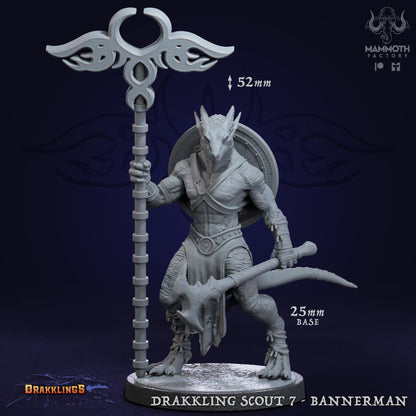 a white statue of a demon holding a staff