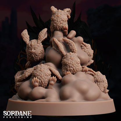 a sculpture of a group of bears surrounded by smaller bears