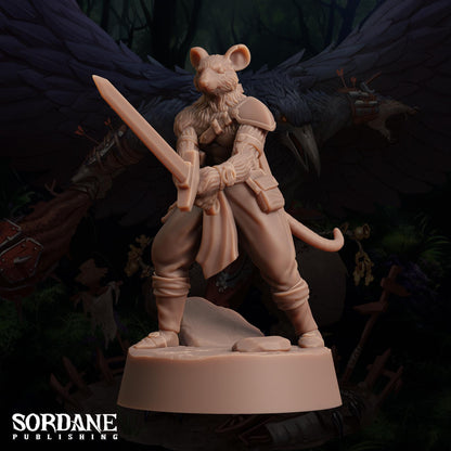 a statue of a mouse holding a sword
